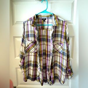 Light colored and light fabric purple flannel in size XL.